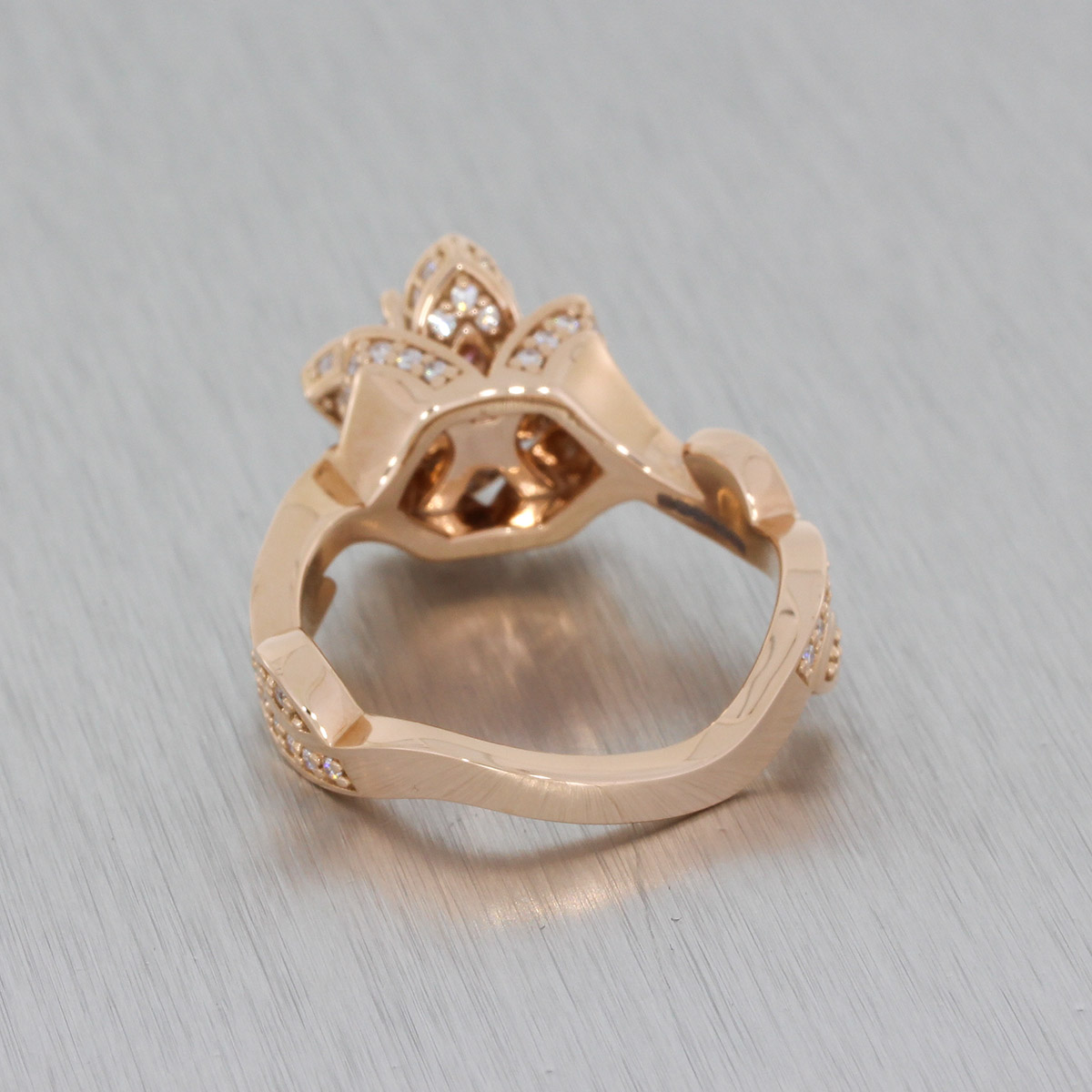 14ct Rose gold floral ring set with moissonite and pink CZ